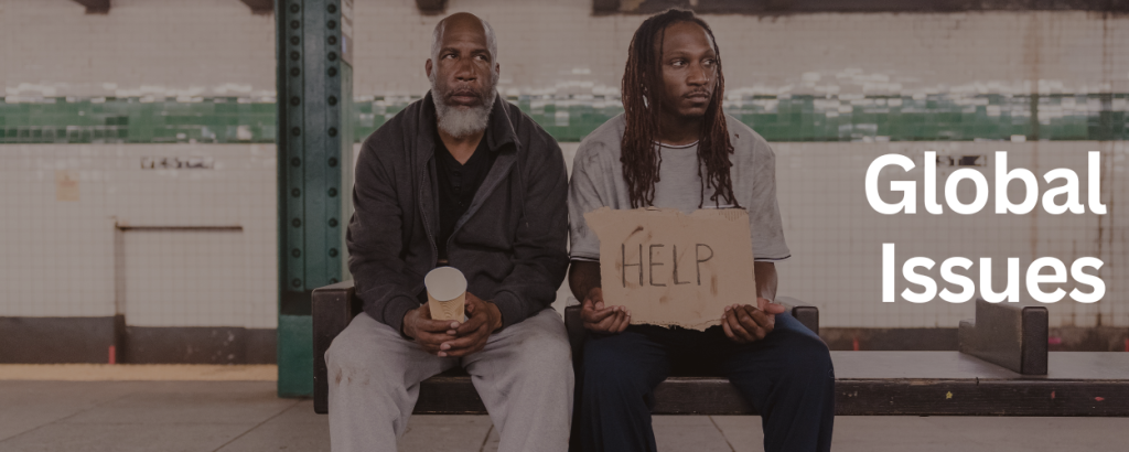 Two men sitting besides each other holding a placard